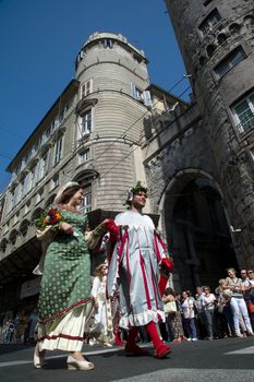 GENOA, ITALY - 8 JUNE 2014 - Unidentified people during the historical parade of the Maritime Republics Palio