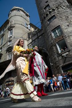 GENOA, ITALY - 8 JUNE 2014 - Unidentified people during the historical parade of the Maritime Republics Palio