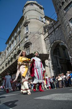 GENOA, ITALY - 8 JUNE 2014 - Unidentified people during the historical parade of the Maritime Republics Palio