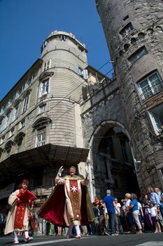 GENOA, ITALY - 8 JUNE 2014 - Unidentified people during the historical parade of the Maritime Republics Palio