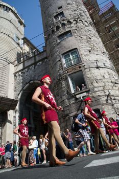 GENOA, ITALY - 8 JUNE 2014 - Unidentified people during the historical parade of the Maritime Republics Palio