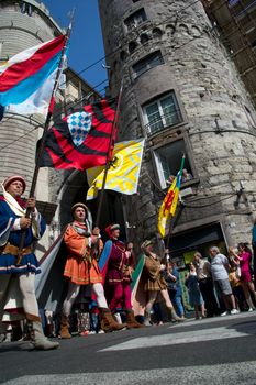 GENOA, ITALY - 8 JUNE 2014 - Unidentified people during the historical parade of the Maritime Republics Palio