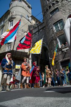 GENOA, ITALY - 8 JUNE 2014 - Unidentified people during the historical parade of the Maritime Republics Palio