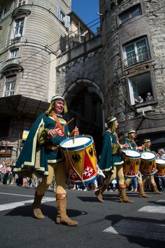 GENOA, ITALY - 8 JUNE 2014 - Unidentified people during the historical parade of the Maritime Republics Palio