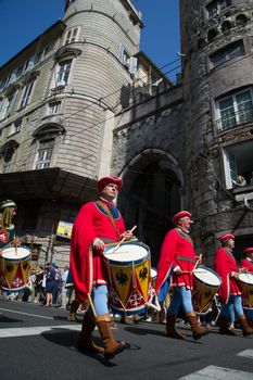 GENOA, ITALY - 8 JUNE 2014 - Unidentified people during the historical parade of the Maritime Republics Palio