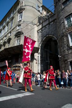 GENOA, ITALY - 8 JUNE 2014 - Unidentified people during the historical parade of the Maritime Republics Palio