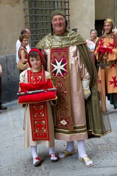 GENOA, ITALY - 8 JUNE 2014 - Unidentified people during the historical parade of the Maritime Republics Palio