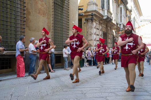 GENOA, ITALY - 8 JUNE 2014 - Unidentified people during the historical parade of the Maritime Republics Palio