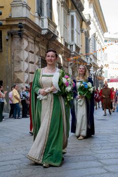 GENOA, ITALY - 8 JUNE 2014 - Unidentified people during the historical parade of the Maritime Republics Palio