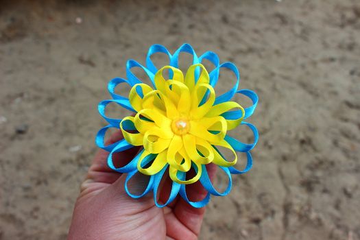 flower of yellow and blue ribbons with bead handmade
