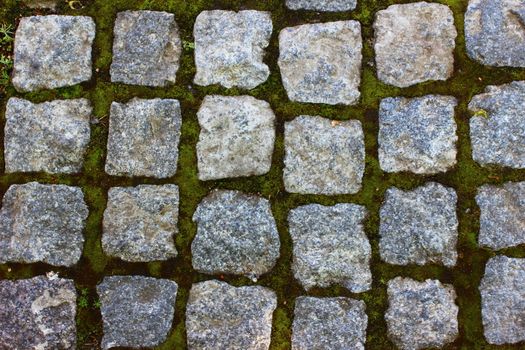 gray-brown stone pavers are laid in neat rows
