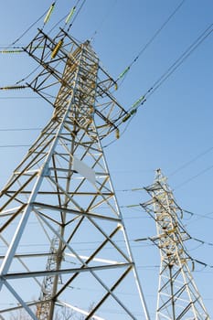 high voltage electric power lines on pylons