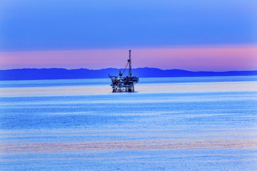 Ellwood Oil Well Offshore Platforms Coastline Pacific Oecan Pink Sunset Goleta California 