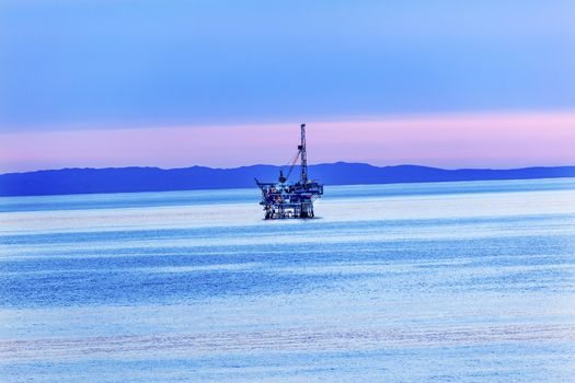 Ellwood Oil Well Offshore Platforms Coastline Pacific Oecan Pink Sunset Goleta California 