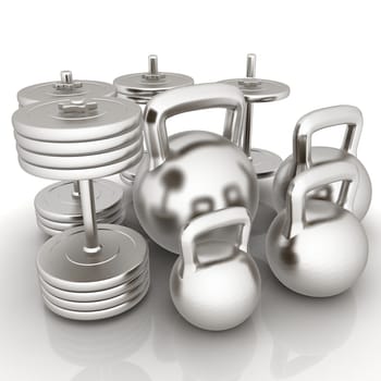 Metall weights and dumbbells on a white background