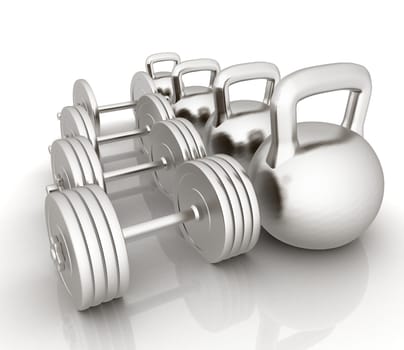 Metall weights and dumbbells on a white background