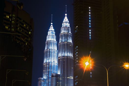 Among the Night City. Buildings near Petronas Twin Towers
Kuala Lumpur, Malaysia, June 17 2014.