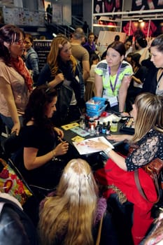 Cosmetic treatment at 23th iinternational fair and congress of cosmetics, solarium, equipment, wellness, spa and hair care, the largest beauty fair in South-east Europe, The touch of Paris, 26th and 27th April 2014. Belgrade,Serbia