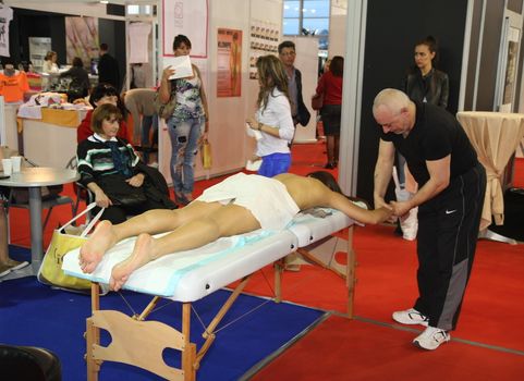 Massage at 23th iinternational fair and congress of cosmetics, solarium, equipment, wellness, spa and hair care, the largest beauty fair in South-east Europe, The touch of Paris, 26th and 27th April 2014. Belgrade,Serbia