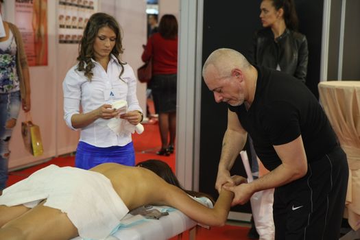 Massage at 23th iinternational fair and congress of cosmetics, solarium, equipment, wellness, spa and hair care, the largest beauty fair in South-east Europe, The touch of Paris, 26th and 27th April 2014. Belgrade,Serbia