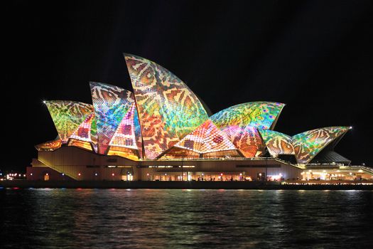 SYDNEY, AUSTRALIA - JUNE 2, 2014;  Vivid Sydney Festival, multi colour reptile snakeprint pattern projected onto the  Sydney Opera House  during Vivid  annual festival of light, music and ideas