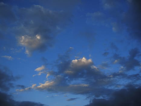 Blue sky and white clouds and the sun