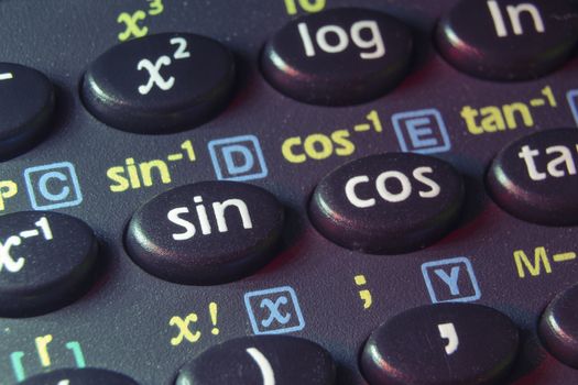 trigonometry functions push buttons of scientific calculator; focus on sin button