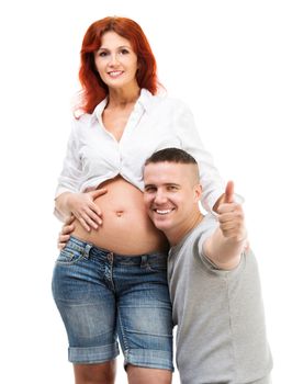 laughing husband hugging his pregnant wife isolated on white
