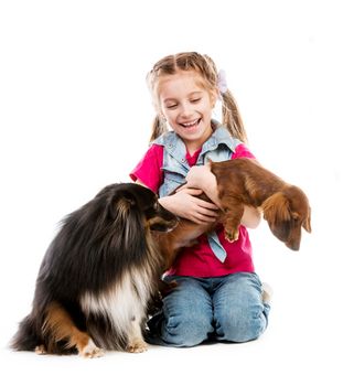 children playing with dogs on white background