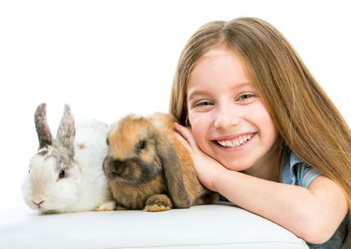 cute little girl with two Easter rabbits