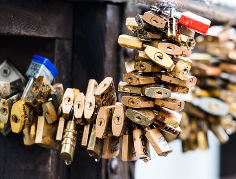 Love Padlocks or Love Locks, a modern symbol of love and marriage, attached to a bridge in Venice