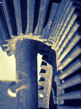 Gear wheel mechanism, artistic toned photo with shallow dof