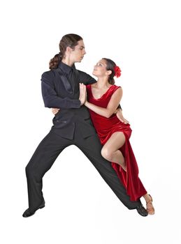 Young couple dancing tango isolated over white