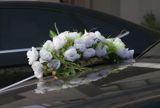 Artificial roses, wedding decoration of a car