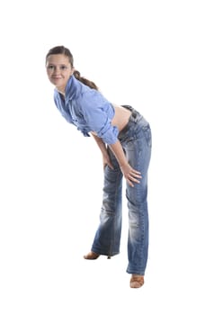 Young woman in jeans and short chemise isolated over white