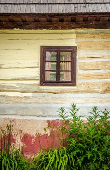 Detail of wooden window on old traditional house in Slovakia
