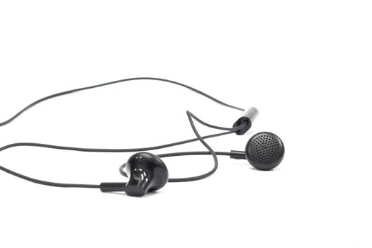 isolated white bac kground  black earphones