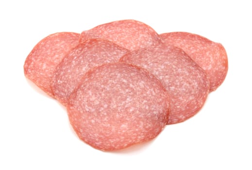 Six German salami slices arranged in a triangle, isolated on a white background