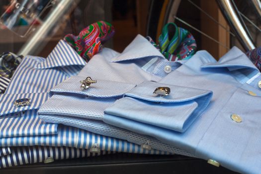 Close up of male shirts exposed in the clothes shop