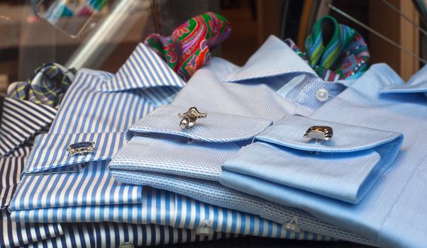 Close up of male shirts exposed in the clothes shop