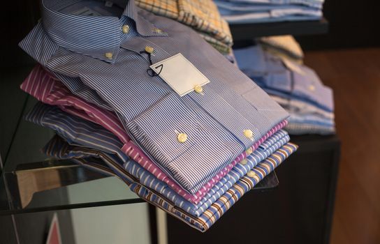 Close up of male shirts exposed in the clothes shop