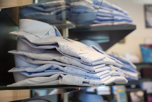 Close up of male shirts exposed in the clothes shop