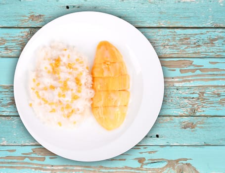 Delicious mango with sticky rice on the table