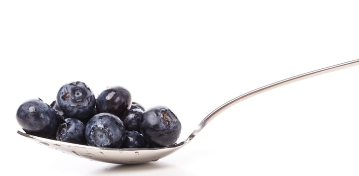 Food, berries. Blueberry with spoon