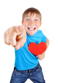 Cheerful Kid with Red Heart Shape pointing at You on the White Background