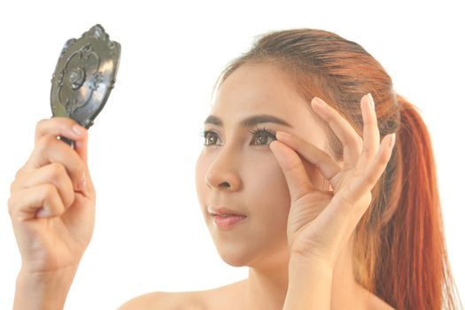 Young asian woman makeup false eyelash isolated on white background