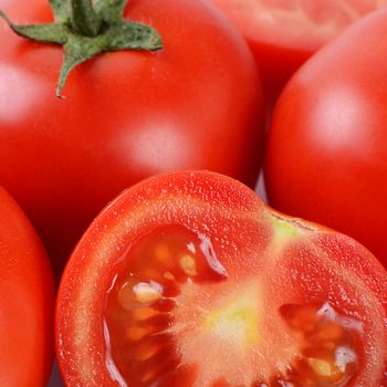 The red fresh tomatoes cut. Close up