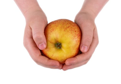 In the children's hands ripe red and yellow apple on a white background