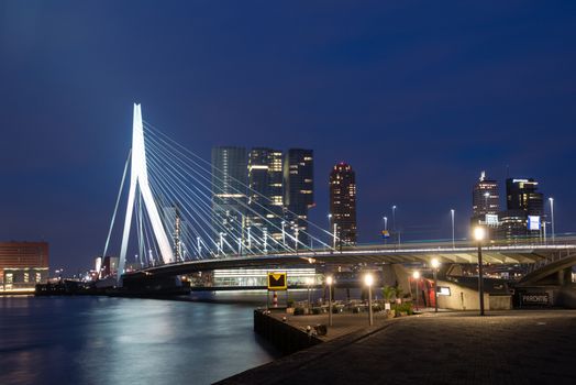 ROTTERDAM, NETHERLANDS - MAY 29, 2014: Erasmus Bridge (Dutch: Erasmusbrug) in the city centre of Rotterdam at night on May 29, 2014 in Rotterdam, South Holland, the Netherlands.