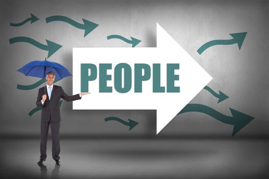 The word people and peaceful businessman holding blue umbrella against arrows pointing